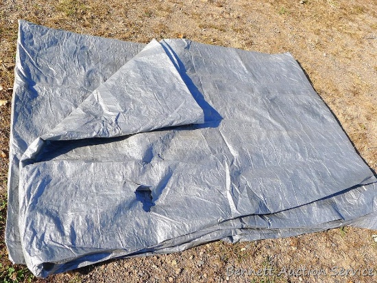 Large tarp. A few holes noted, but would do a good job covering a wood pile. Approx 14' x 28'.