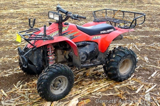 Polaris Scrambler 4 wheel drive ATV with liquid cooled 500cc four stroke engine.