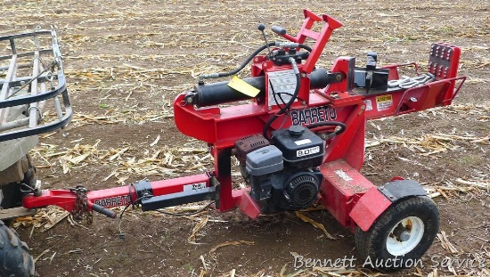 Barreto hydraulic log splitter has a 24" capacity. Pivots for vertical usage. Runs. Has a 9.0 motor,