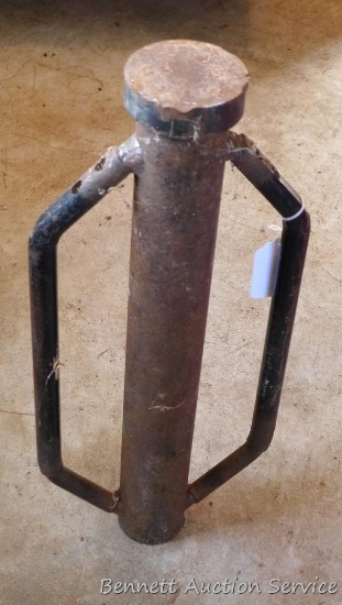 Post pounder is 22" high and has a 2" hole.