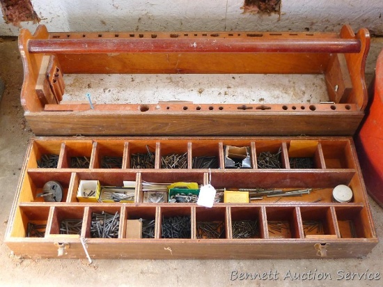 Wonderful carpenter's tool box with tray holds a variety of screws and nails. Box is about 38" x 13"