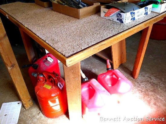 Work table is about 49" x 55" x 34" high overall. Has two circular cutouts for some special purpose.