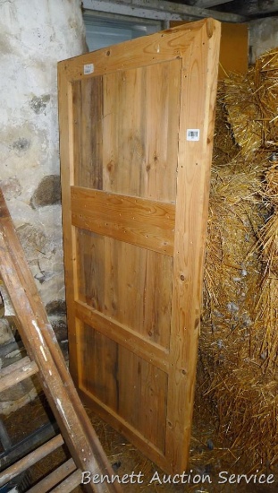 Wooden door panel is 30" x 66" x 2". Would make a very cool track or sliding door.