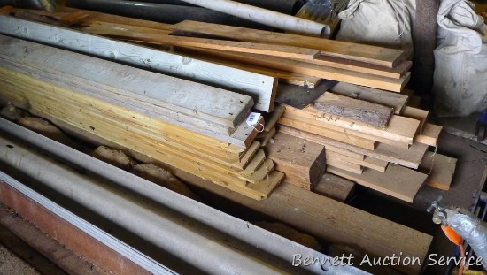Nice stack of 1" and 2" lumber up to 7" wide and up to 18' long. Some is treated. One piece is