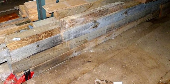 Several large lumber beams up to 6" x 6" x 12-1/2'.