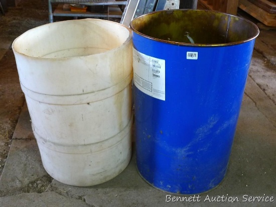 Steel drum is about 23" x 35" high; plastic barrel is approx 22" x 32" high. Great to use as large
