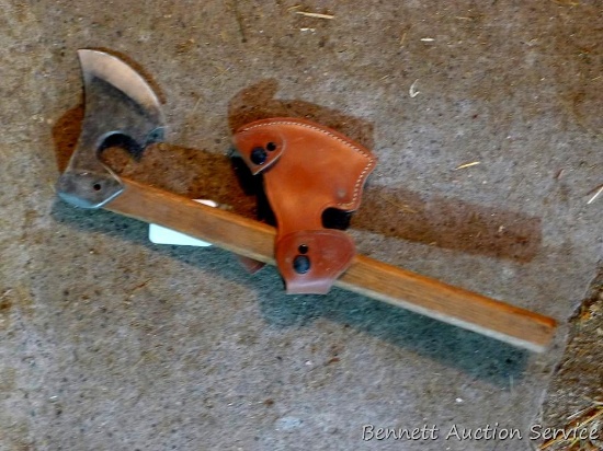 Unique hatchet is 18" long with 4" x 5-1/2" blade and leather sheath.