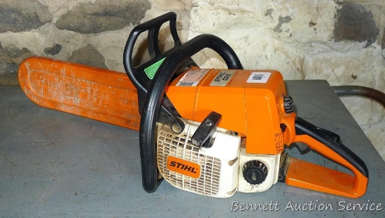 Stihl 025 chainsaw with 14" bar and bar cover. Runs and idles well.