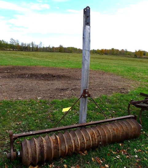 Steel cultipacker is 90" wide with a 7' wooden hitch pole.