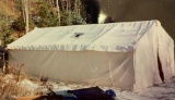 Canvas wall tent with rain fly and wood stove.  Great for hunting camp or long stays outback.