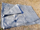 Large tarp. A few holes noted, but would do a good job covering a wood pile. Approx 14' x 28'.