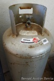 No shipping. 100 lb propane gas cylinder is 4' high, stored inside and in good condition.