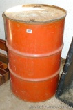 55 gallon steel drum with lid is about 3' high and 2' wide. No holes, great for storing feed,