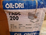 Mostly full box of light weight Oil Dri absorbent pads. Pads are about 20