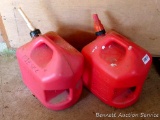 Two 5 gallon gas totes have a little liquid in bottoms. If shipped will be emptied for a fee.