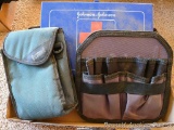 Bushnell case, metal Johnson & Johnson first aid kit, more. First aid kit is approx 11