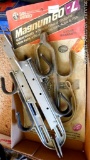 Two San Angelo gun racks, one NIP. Extendable pair opens to 17