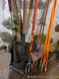 Fiberglass and steel fence posts; flat blade shovel with wooden handle; weed cutter; lawn edger;