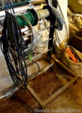 Rolling wire spool dispenser is 23