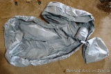 Lightweight car cover is size large and comes with carrying case. A little over 16' end to end. Item