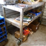 Very heavy duty steel work table with lower shelf on 6
