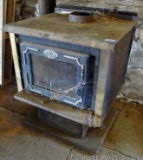 Heavy steel wood stove with electric blower is 26