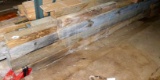 Several large lumber beams up to 6