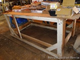 Sturdy wooden work bench. Frame is 82