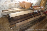 Pile of really nice round wooden fence posts averaging 5-1/2