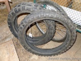 Continental Twinduro tubeless dirt bike tires. One is marked 