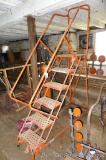 Nice rolling ladder could also be remade into a tree stand. Rated 300 lb working load, great for a