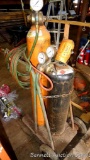 No shipping. Oxy-acetylene torch set includes oxygen and acetylene tanks on a cart, hose, Victor