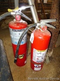 No shipping. Two fire extinguishers. Shorter is charged, taller needs a charge. Taller is 21