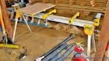 DeWalt miter saw stand with folding legs and table extensions. Also includes four 16