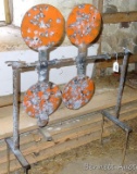 Large spinning target has stakes for extra stability. Has 9