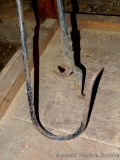 Nice fireplace poker, plus a gaff hook. Longer is 50