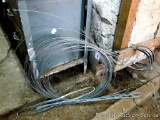 Four bundles of fencing wire. Coil averages about 27