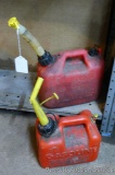 No shipping. 1 and 1.25 gallon gas totes. Larger is half full and has knob on back to let in air.