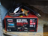 Century marine deep cycle battery charger is model 87122. 12 amp, 6 & 12 volt, has automatic