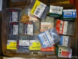 Machine screws, sheet metal screws, stop nuts, hex nuts, and combination screws. Some boxes full,
