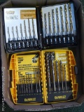 Dewalt and Montana brand drill bits with carry cases. Dewalt is missing only two bits.