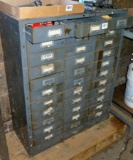 Metal storage cabinet with drawers; measures 31
