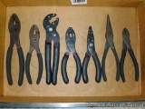 Pliers including side cutters, needle nose, adjustable and regular pliers.