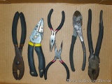 Assortment of pliers include needle nose, side cutters, pliers and more.