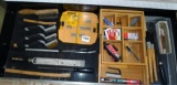 DeWalt tough case container, assortment of wire brushes, Craftsman pick, cleaning brushes, Sawzall