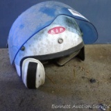 Motocross helmet is marked size L and has face shield.