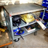 Nice steel rolling cart has 2 lower shelves, 6