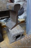 Two pieces of railroad iron. Largest is 6-1/2
