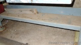 Sturdy wooden work bench with heavy metal legs is 30