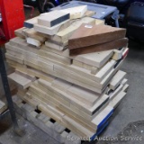 Stack of hardwood pieces, assorted sizes. Whole pile is approx. 32